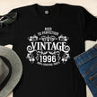 Close-up of the Vintage 1996 Aged to Perfection print on a black 30th birthday t-shirt