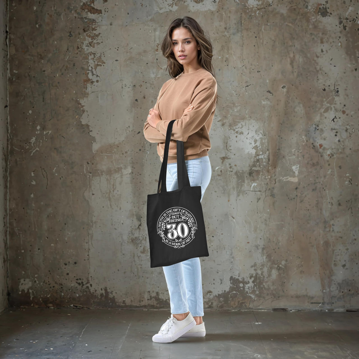 Being 30 is a Work of Art 30th birthday tote bag in black carried over the shoulder