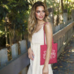 Vintage 1996 Aged to Perfection 30th birthday tote bag in raspberry pink carried over the shoulder