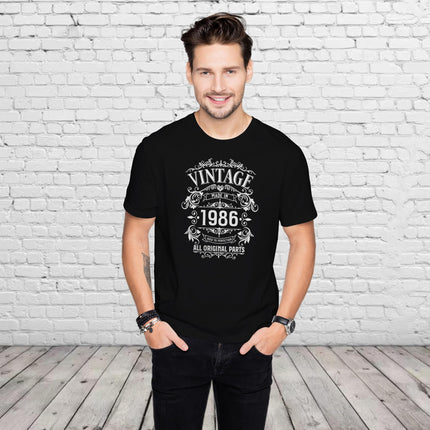 Man wearing the Vintage 1986 All Original Parts 40th birthday t-shirt in black
