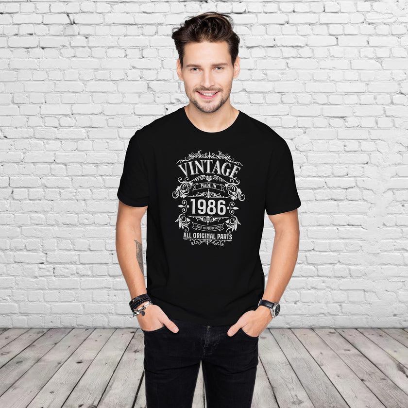 Man wearing the Vintage 1986 All Original Parts 40th birthday t-shirt in black