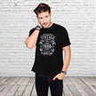 Smiling man in the black Vintage 1986 All Original Parts 40th birthday t-shirt