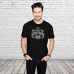 Man wearing the Vintage 1986 Aged to Perfection 40th birthday t-shirt in black