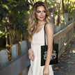 Vintage 1986 Aged to Perfection 40th birthday tote bag in black carried over the shoulder