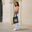 Being 40 is a Work of Art 40th birthday tote bag in black carried over the shoulder