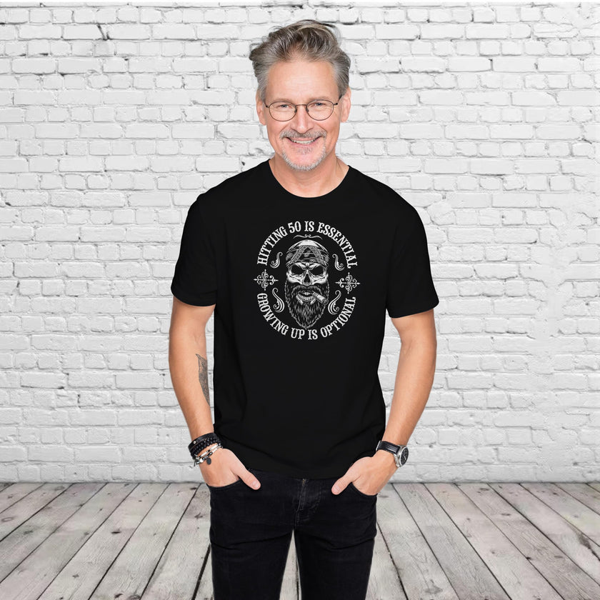 Man wearing the Hitting 50 is Essential 50th birthday t-shirt in black