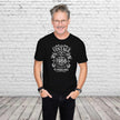 Man wearing the Vintage 1966 All Original Parts 60th birthday t-shirt in black