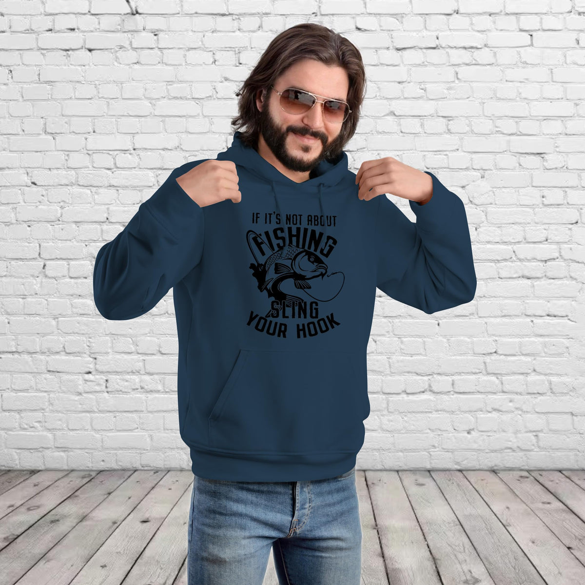 Man pointing at the Sling Your Hook print on his airforce blue carp fishing hoodie