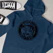 Close-up of the Born to Fish print on an airforce blue fishing hoodie