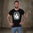 Man in the black Commit or Quit mountain bike t-shirt with hands on hips
