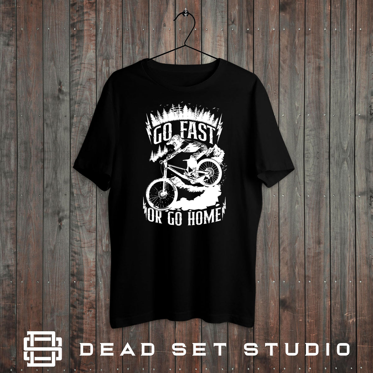 Go Fast or Go Home mountain bike t-shirt in black on a rustic wood background