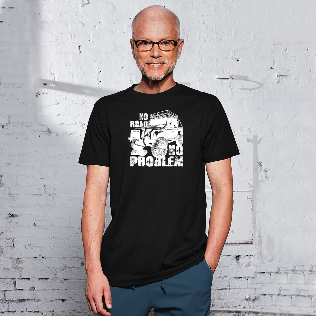 Smiling man in the black No Road No Problem off road 4x4 t-shirt
