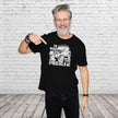 Man pointing at the No Road No Problem print on his black off road 4x4 t-shirt
