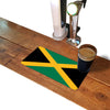 Jamaican flag rubber bar runner mat on a home bar counter