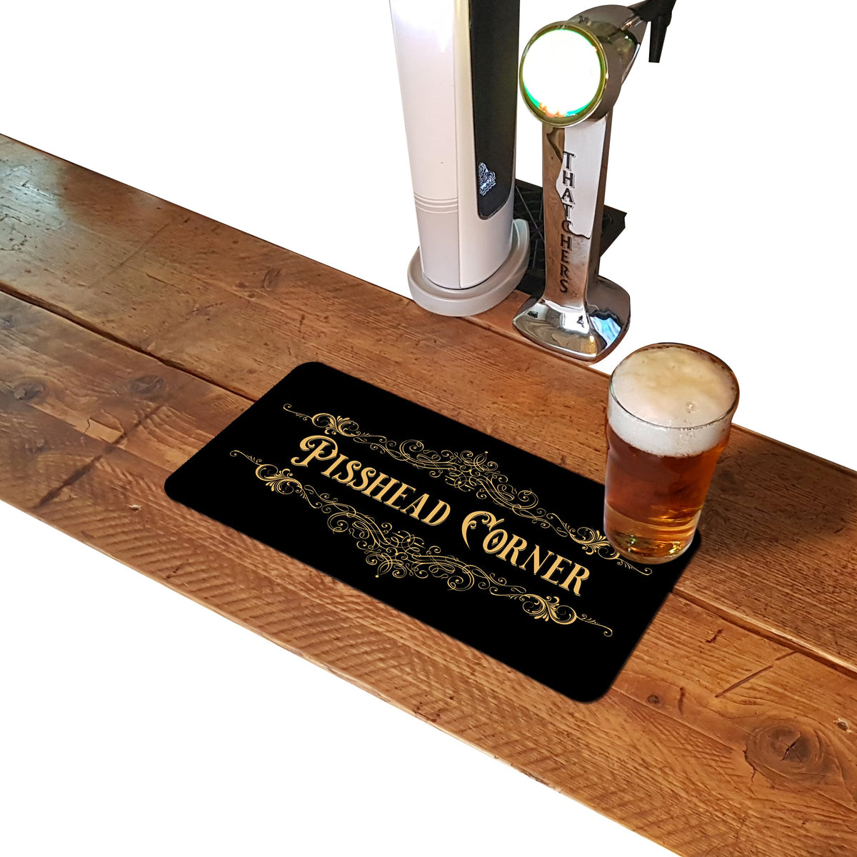 Pisshead Corner rubber bar runner mat on a home bar counter