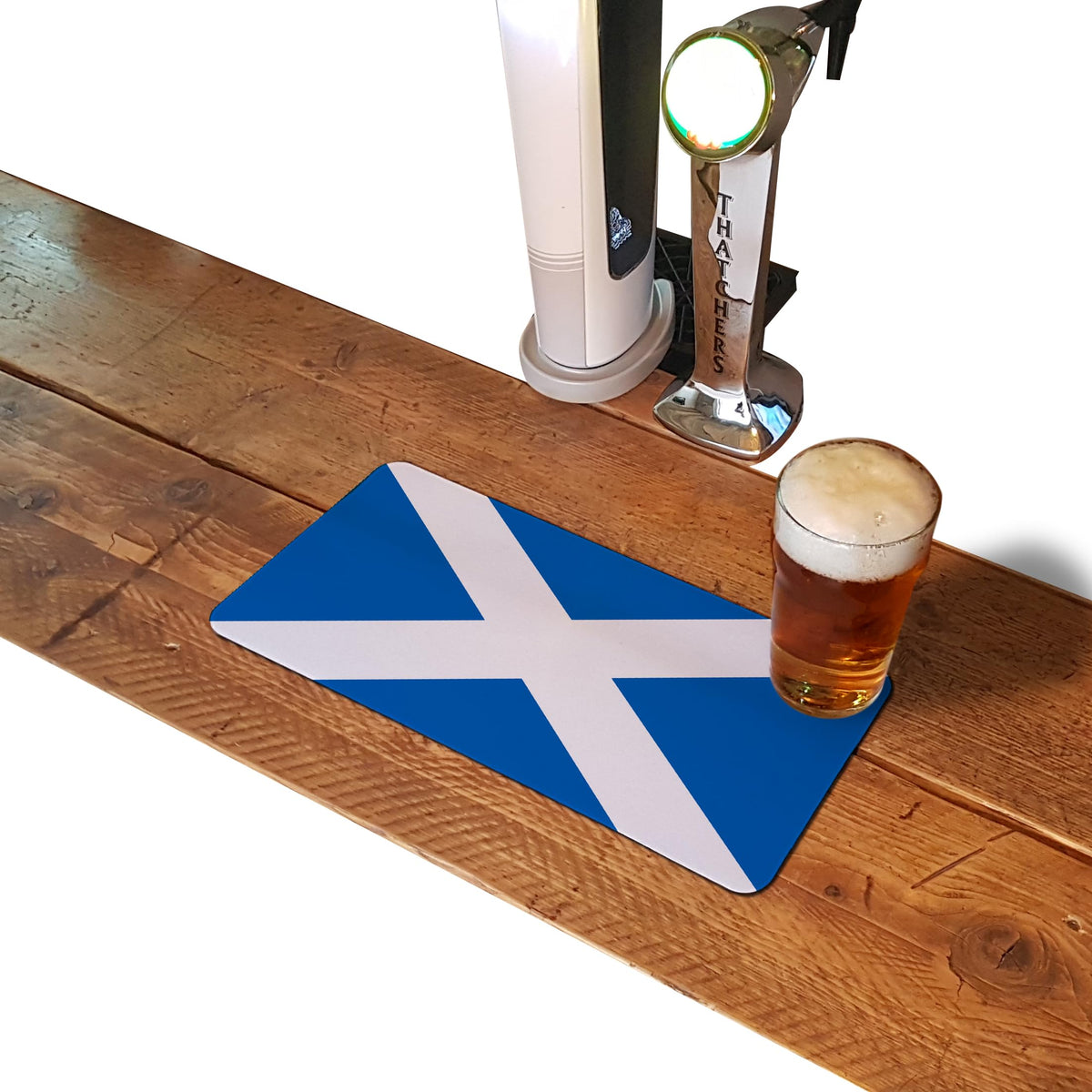 Scottish flag rubber bar runner mat on a home bar counter