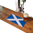 Scottish flag rubber bar runner mat on a home bar counter